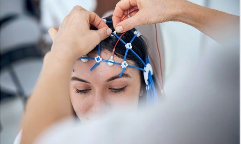TMS therapy treatment coil during a treatment session